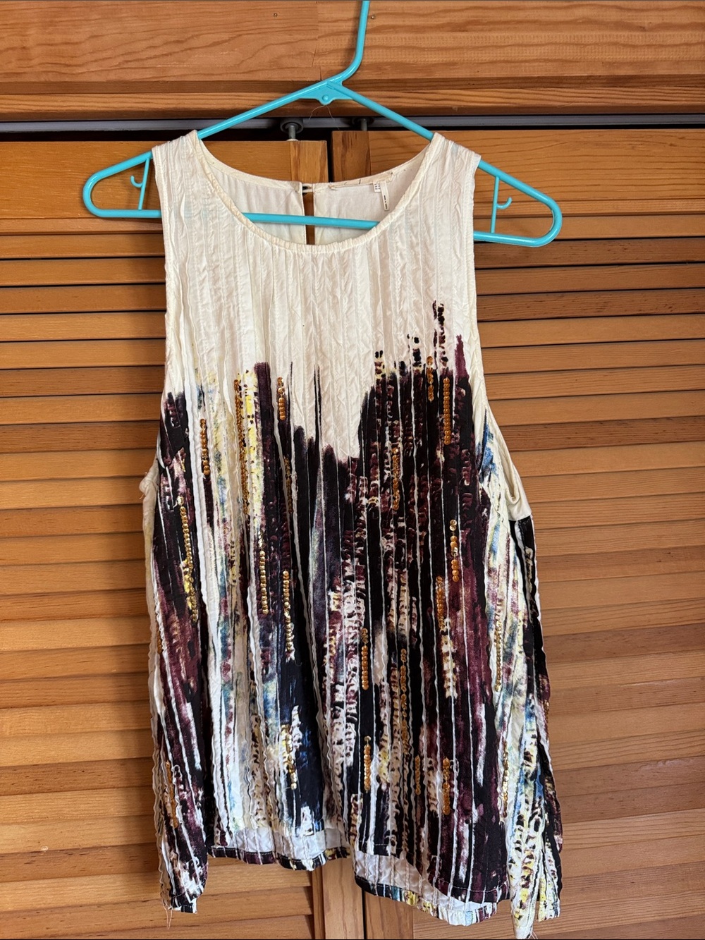 Anthropologie-Print sleeveless top in Cream, Black & Maroon with gold sequins